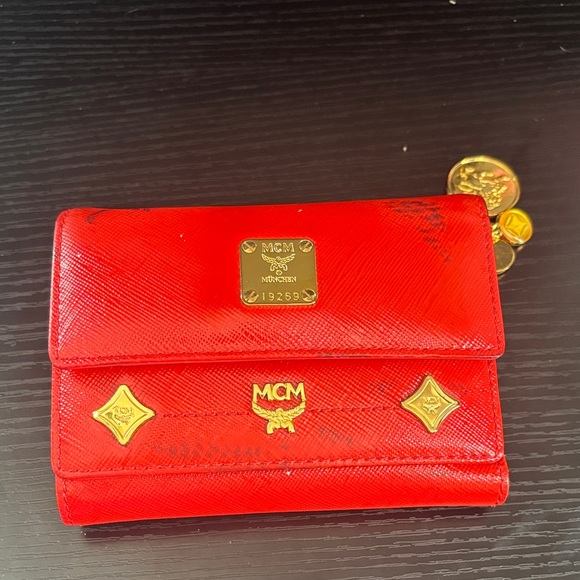 MCM Handbags - MCM limited edition, lion vintage Scarlet Wallet with charms color transfer